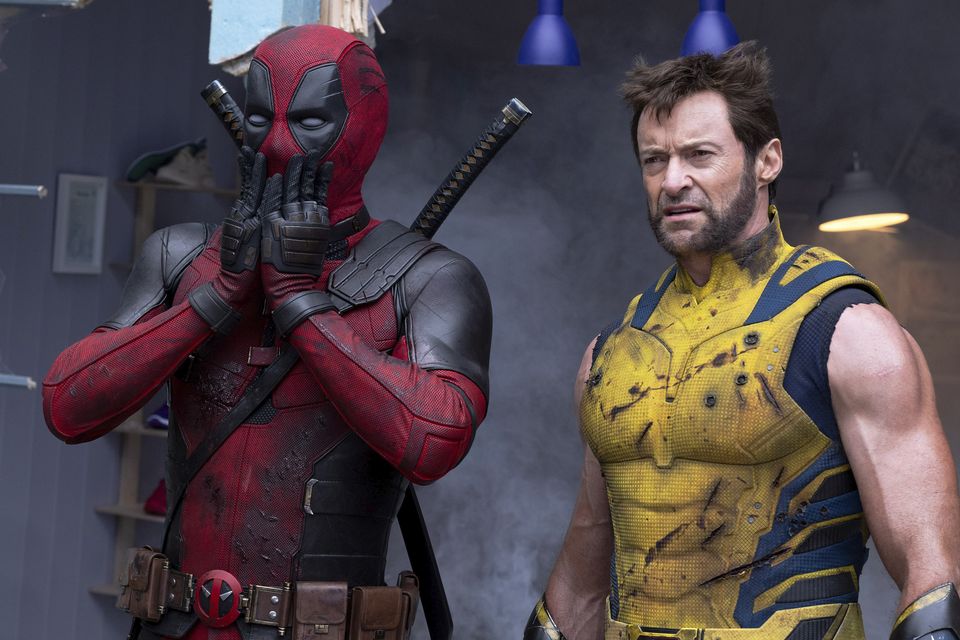 Ryan Reynolds as Deadpool/Wade Wilson, left, and Hugh Jackman as Wolverine/Logan in a scene from Deadpool & Wolverine (20th Century Studios/Marvel Studios via AP)