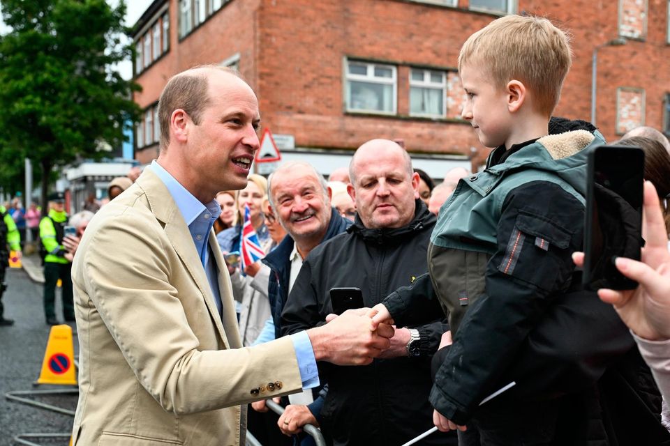 BELFAST, NORTHERN IRELAND - JUNE 27: Prince William, Prince of Wales meets members of the public after his visit to the East Belfast Mission at the Skainos Centre as part of his tour of the UK to launch a project aimed at ending homelessness on June 27, 2023 in Belfast, United Kingdom. The Prince of Wales has launched Homeward, a five-year programme delivered by the Royal Foundation, which will aim to demonstrate the possibility of ending homelessness. He is currently on a 2 day tour of the United Kingdom, visiting charities working to prevent homelessness in England, Scotland and Wales.  (Photo by Tim Rooke -Pool/Getty Images)