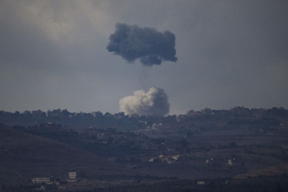 Smoke is seen rising following an explosion in southern Lebanon on Thursday (Leo Correa/AP)