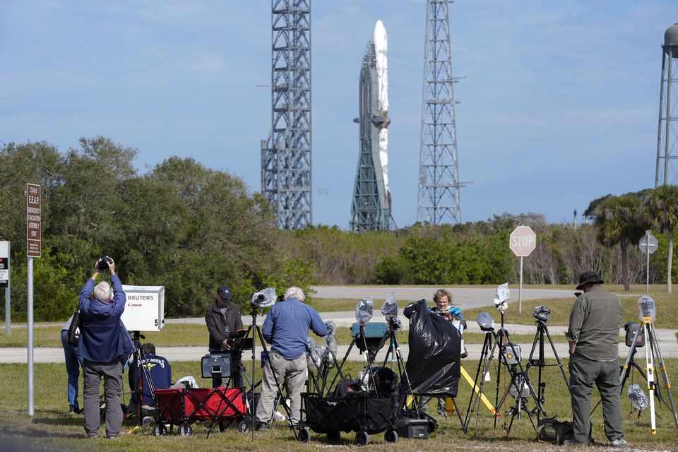 Photographers await another launch attempt of Blue Origin’s rocket at the Cape Canaveral Space Force Station (John Raoux/AP)