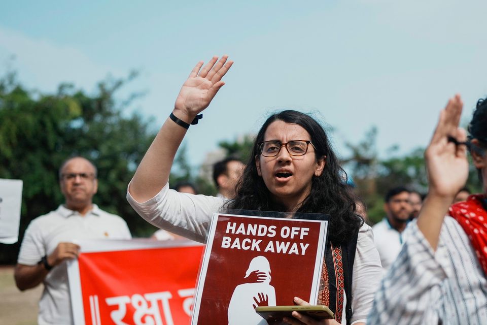 Indians protesting against the rape and killing of a trainee doctor (Rafiq Maqbool/AP)