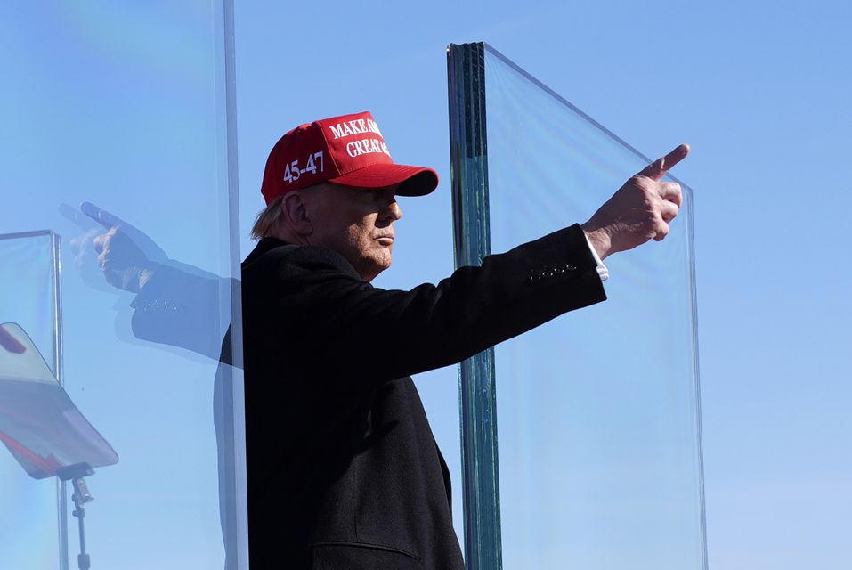 Donald Trump gestures as he finishes speaking at a campaign rally in Lititz, Pennsylvania, on Sunday (Evan Vucci/AP)