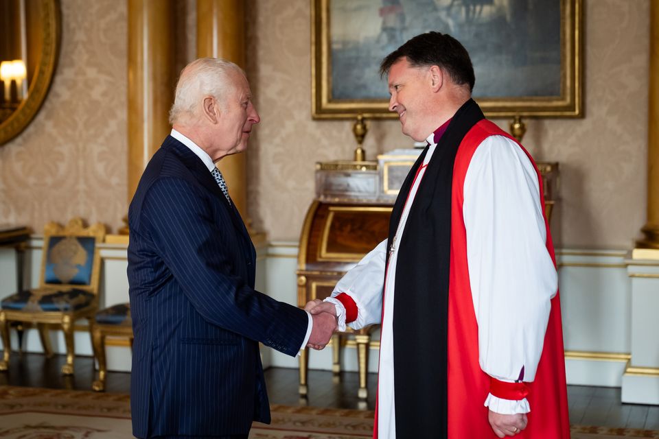 The King with Mr Usher (Aaron Chown/PA)