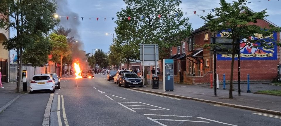 A vehicle is set alight in Belfast following an anti-Islamic protest outside Belfast City Hall (PA)