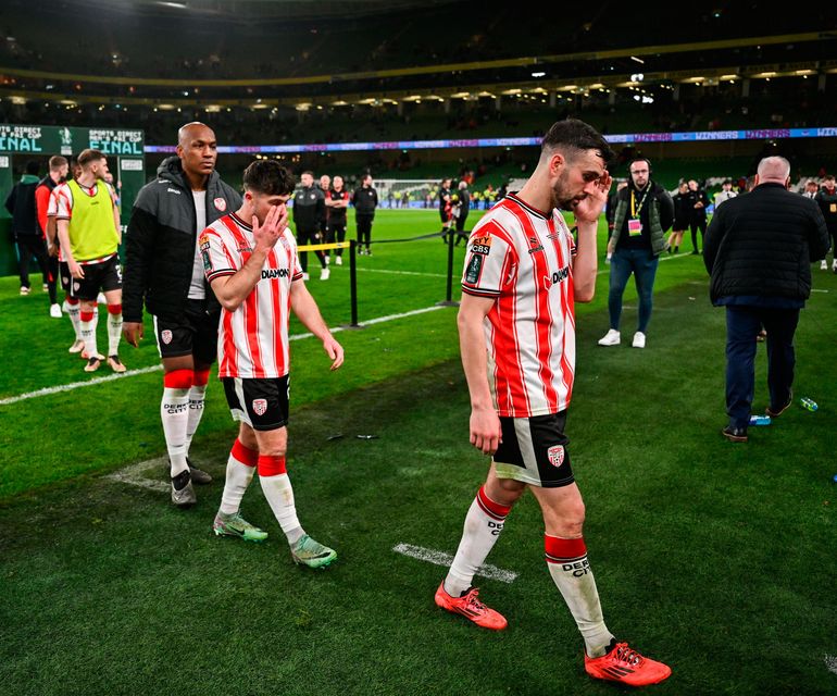 Derry City players leave the pitch after the FAI Cup final defeat to Drogheda United