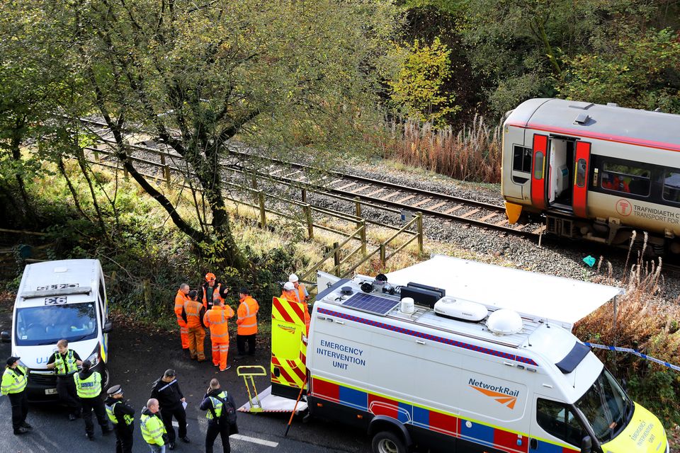 Emergency workers at the scene near Llanbrynmair (Ian Cooper/PA)