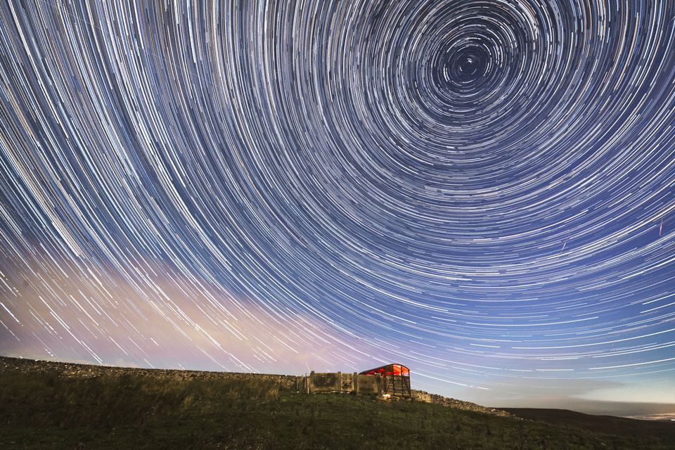 Using a camera with a long exposure over a long period of time is the best way to capture meteor showers and may produce star trail photographs (File photo/Danny Lawson/PA)