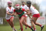 thumbnail: Tyrone's Clara Doherty and Neasa McElroy tackle Cathy Greally of Mayo during the Electric Ireland All-Ireland Minor ‘C’ Final