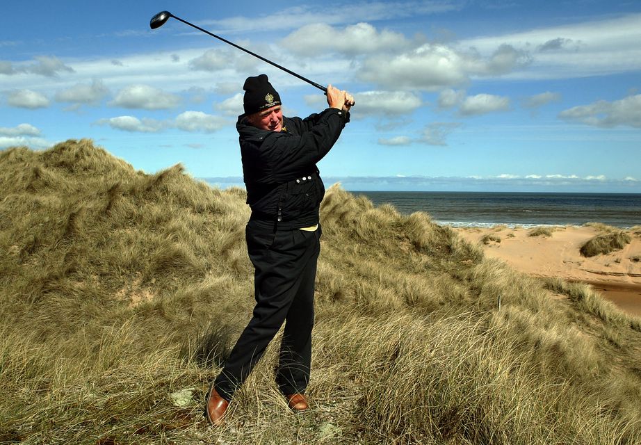 Donald Trump visited the beach where he planned to build a £300 million golf course at Menie Estate near Aberdeen in April 2006 (David Cheskin/PA)