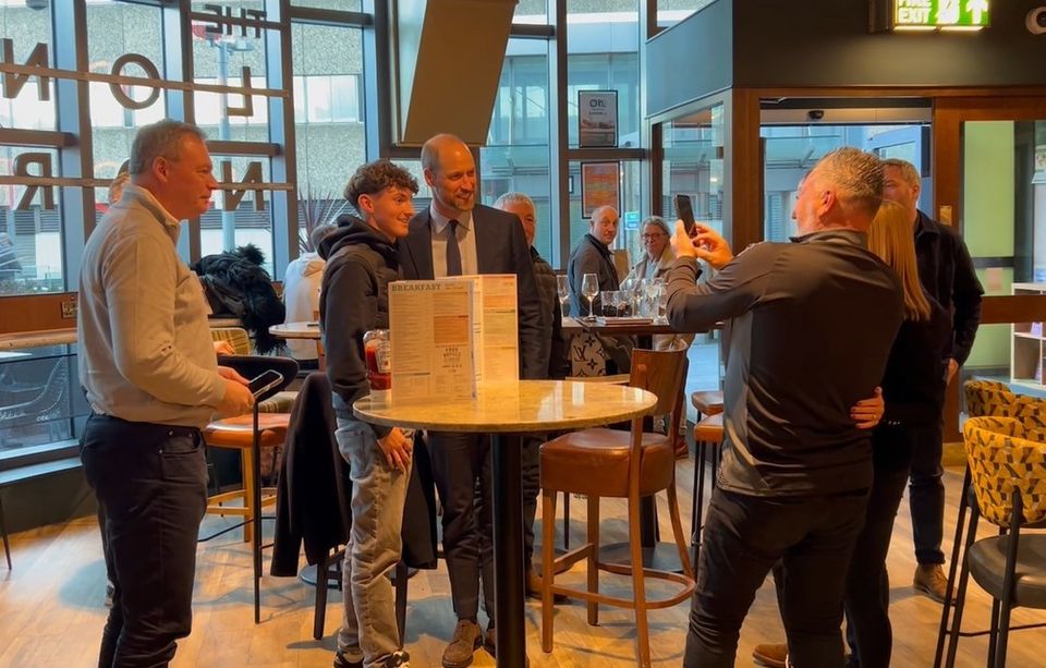 The Prince of Wales meeting Aston Villa supporters in a Wetherspoons pub in Birmingham (Daniel Jones/PA)