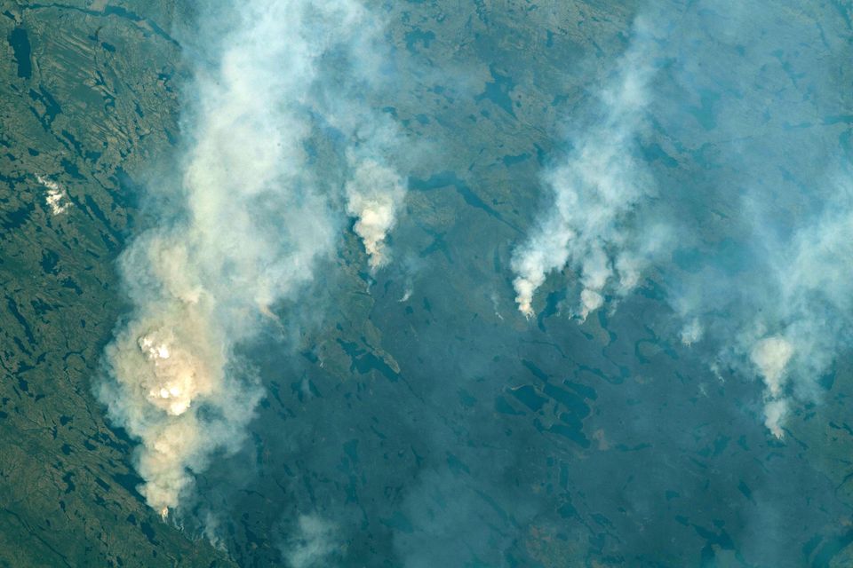 Wildfires in the Canadian province of Quebec in June 2023 seen from the International Space Station (Alamy/PA)