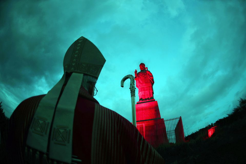 The world’s tallest statue of St Patrick has turned red for 'Week of Witness'.