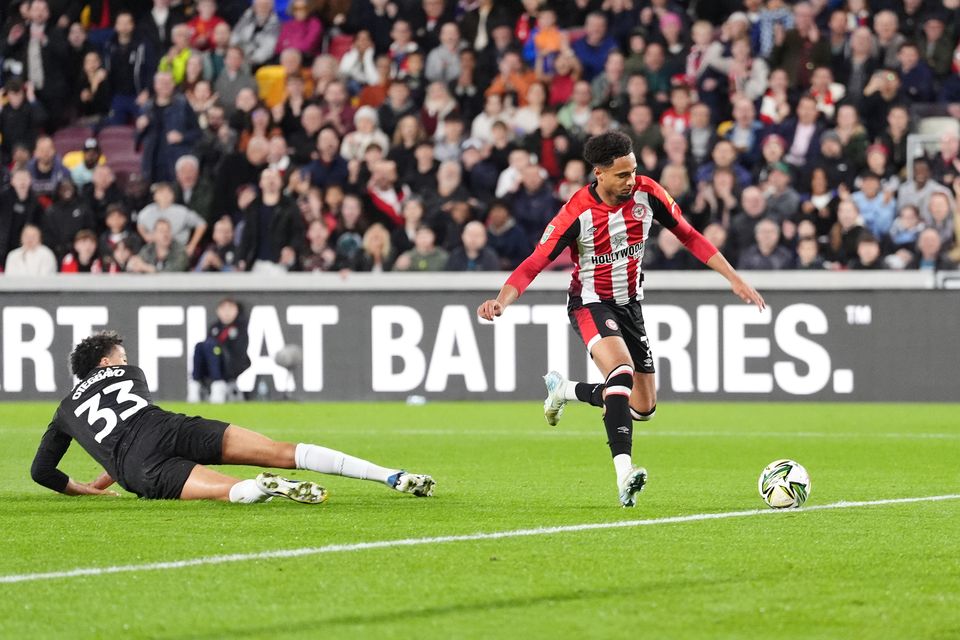 Kevin Schade, right, steadies himself to score Brentford’s opener (Adam Davy/PA)