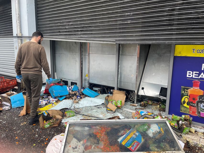 A supermarket badly damaged by fire on the Donegall Road in south Belfast (Jonathan McCambridge/PA)