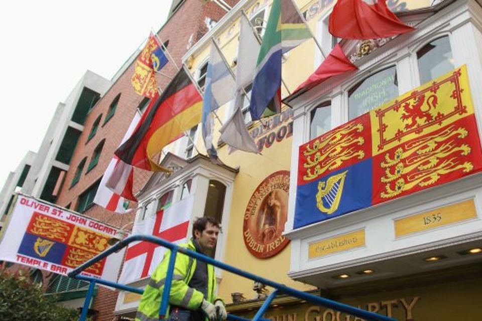 The Royal Standard flag flies from an Irish pub ahead of the state visit to Ireland by the Queen on May 16, 2011 in Dublin, Ireland.