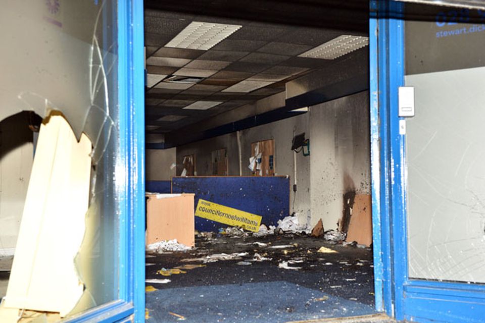 Alliance party office which was set on fire in Carrickfergus after a protest rally over the Union flag