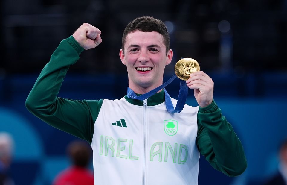 Ireland’s Rhys McClenaghan receives his gold medal (Peter Byrne/PA)