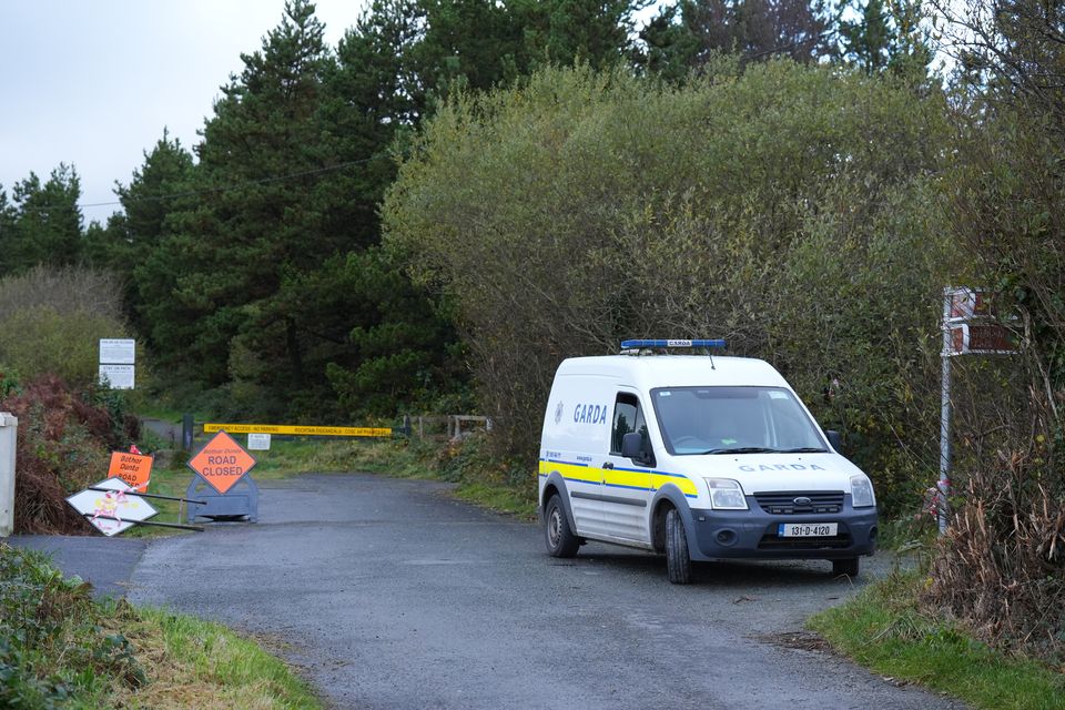 Garda near the scene after the body of a man was found at Carrigfoyle Lake, near Wexford town, on Sunday (Niall Carson/PA)