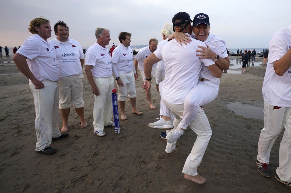 Celebrations on the sand (Andrew Matthews/PA)