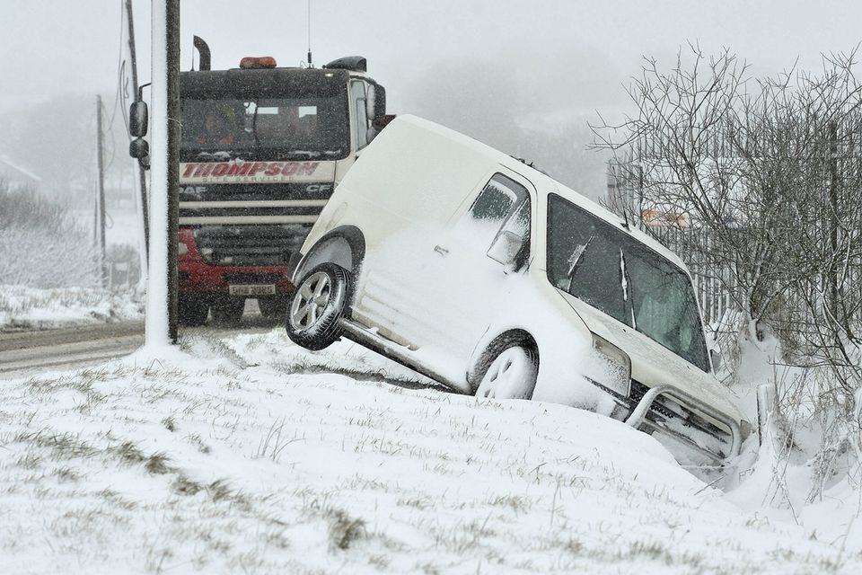 General view of a Transit van which skidded off the road on the Hannahstown hill. Mandatory Credit © Stephen Hamilton