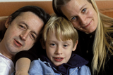 thumbnail: Troubled childhood: Macaulay Culkin with mum Patricia and father Kit in 1990