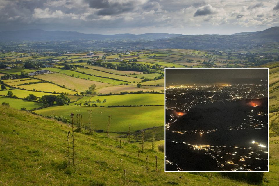 The fire began raging in hills outside Hilltown (main image - stock)