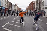 thumbnail: Protesters throw missiles at Irish police in the streets adjacent to the Garden on Remembrance where Queen Elizabeth II laid a wreath on May 17, 2011 in Dublin, Ireland.