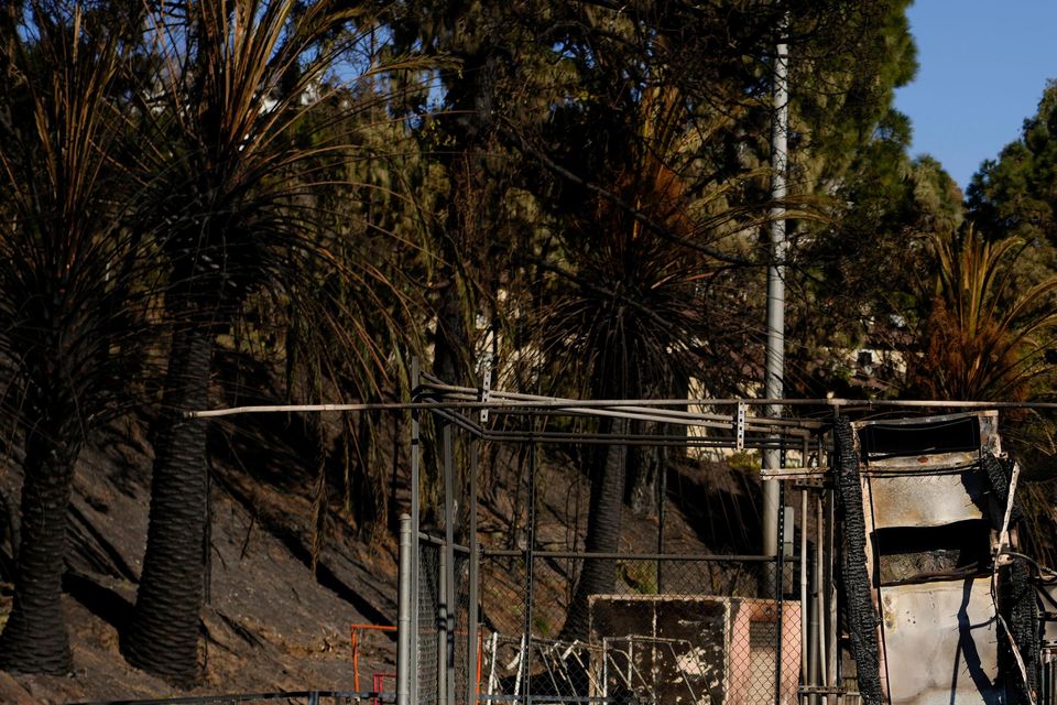 Buildings near athletic fields at Palisades High School in the aftermath of the Palisades Fire in the Pacific Palisades neighbourhood of Los Angeles (Carolyn Kaster/AP)