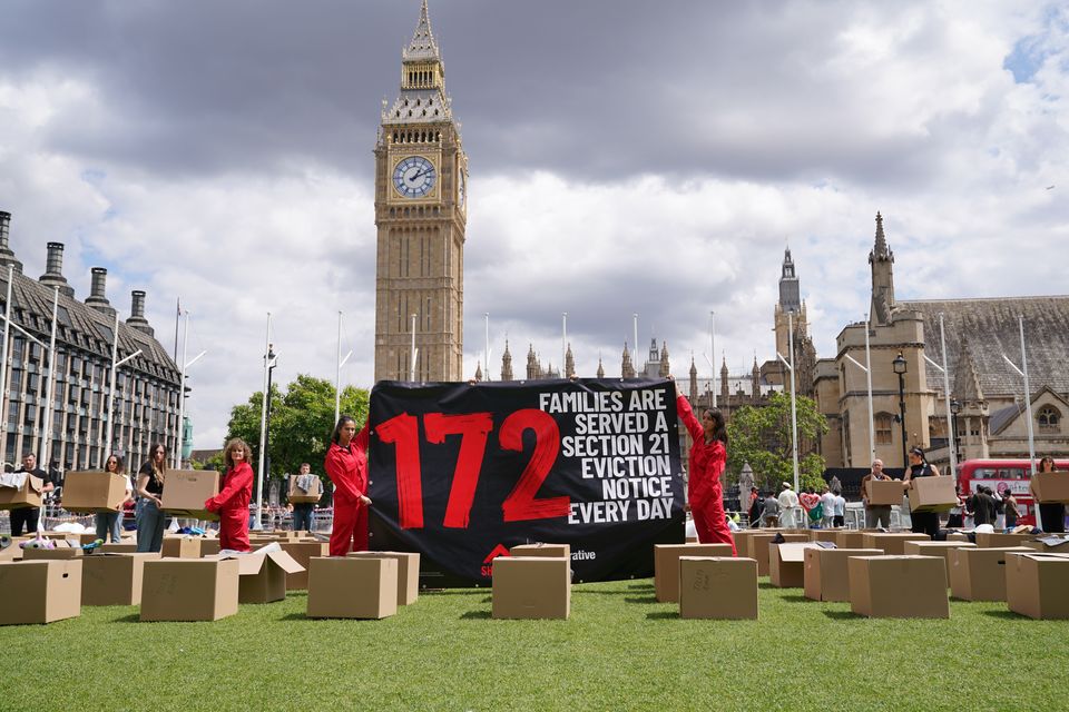 Activists from Shelter protest no-fault evictions in Parliament Square in 2023 (Lucy North/PA credit)