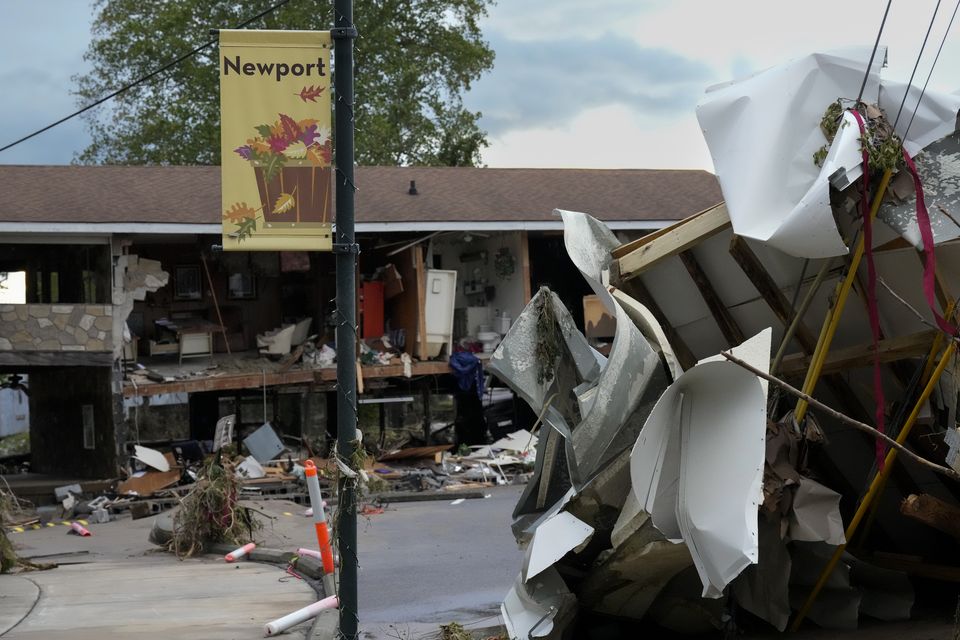 A flood-damaged building and debris left by Hurricane Helene is seen in Newport (George Walker IV/AP/PA)