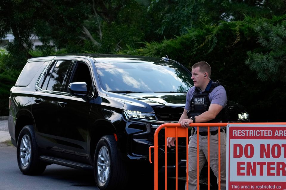 Law enforcement blocks off a street near President Joe Biden’s beach house (Matt Slocum/AP)