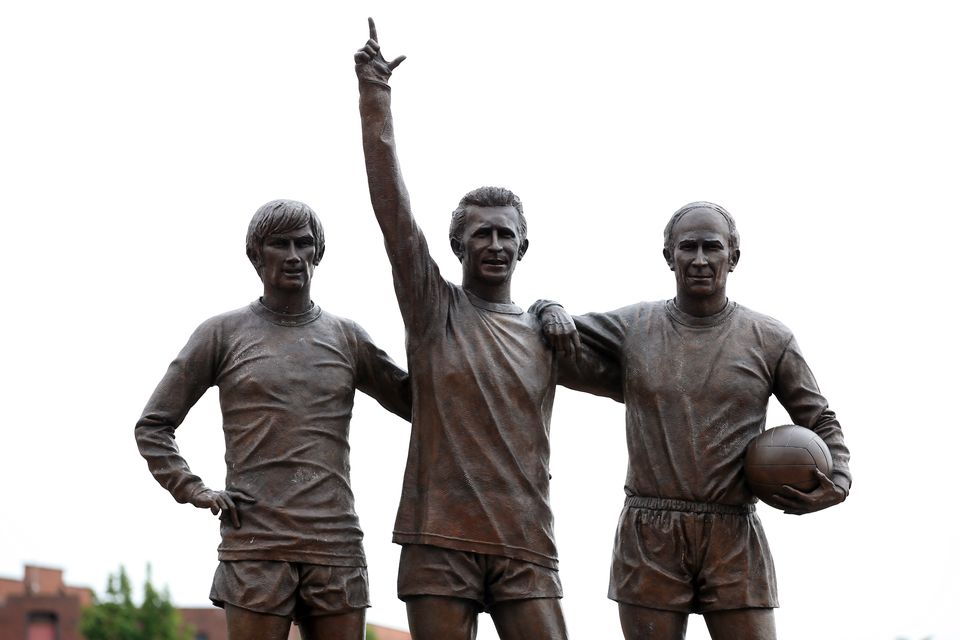 A statute of George Best, Law and Bobby Charlton, Manchester United’s ‘Holy Trinity’, stands outside Old Trafford (Nick Potts/PA).