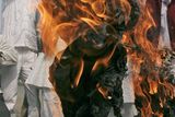 thumbnail: Supporters of Socialist Party burn an effigy of a terrorist involved in Mumbai shooting, in Allahabad, India, Thursday, Nov. 27, 2008. Teams of gunmen stormed luxury hotels, a popular restaurant, a crowded train station and a Jewish group's headquarters, killing people, and holding Westerners hostage in coordinated attacks on the nation's commercial center that were blamed on Muslim militants. (AP Photo/Rajesh Kumar Singh)