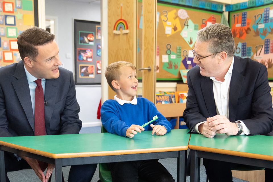 Sir Keir Starmer and shadow health secretary Wes Streeting, during a visit to Whale Hill Primary School, Middlesbrough, where pupils have been demonstrating their teeth-cleaning exercises (Stefan Rousseau/PA)