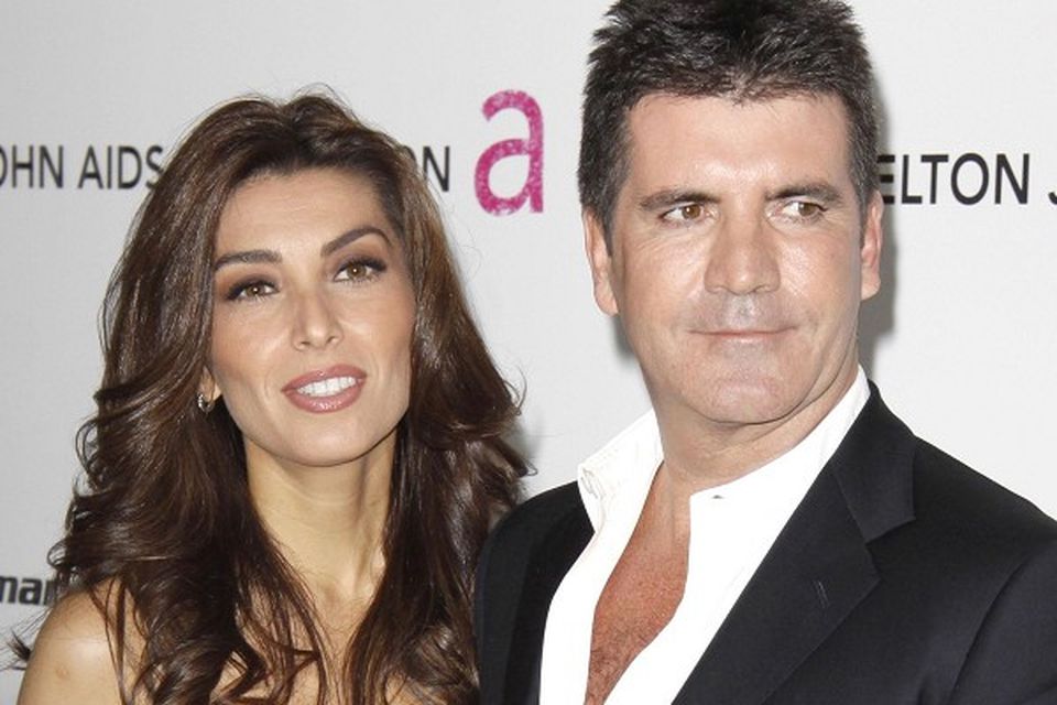 Simon Cowell is reportedly giving ex-fiancee Mezhgan Hussainy a house because he was a bad boyfriend