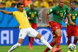 thumbnail: BRASILIA, BRAZIL - JUNE 23: Luiz Gustavo of Brazil challenges Maxim Choupo-Moting of Cameroon during the 2014 FIFA World Cup Brazil Group A match between Cameroon and Brazil at Estadio Nacional on June 23, 2014 in Brasilia, Brazil.  (Photo by Stu Forster/Getty Images)