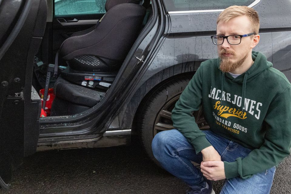 Andrew Ross whose car window was smashed when a brick was thrown through it on Sunday afternoon. Pic: Luke Jervis/Belfast Telegraph