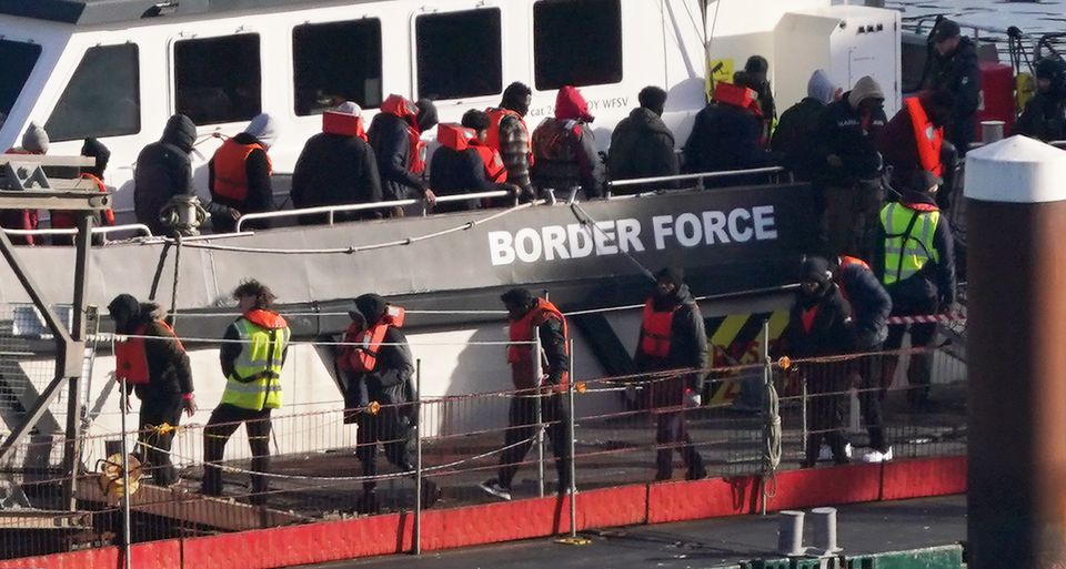 A group of people thought to be migrants are brought in to Dover, Kent, from a Border Force vessel following a small boat incident in the Channel (Gareth Fuller/PA)