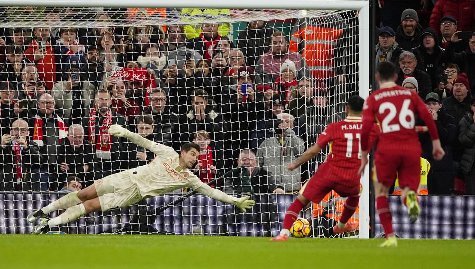 Mohamed Salah made no mistake from the spot (Peter Byrne/PA)