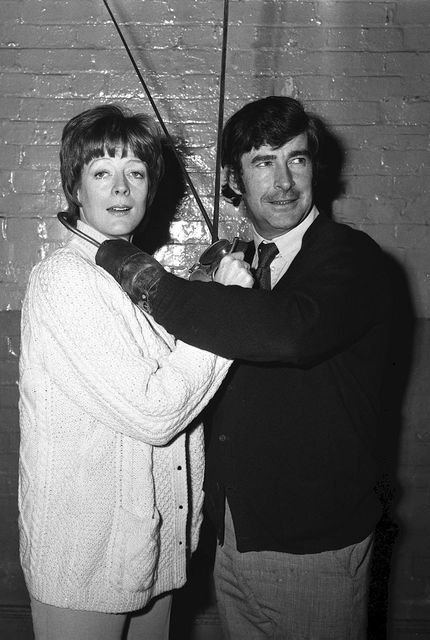 Dame Maggie Smith rehearses for Peter Pan with Dave Allen in 1973 (PA)