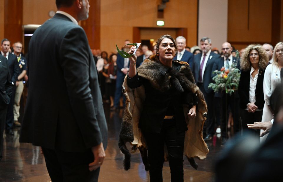 Australian senator Lidia Thorpe protests during the ceremonial welcome for the King and Queen in Canberra (Victoria Jones/PA)