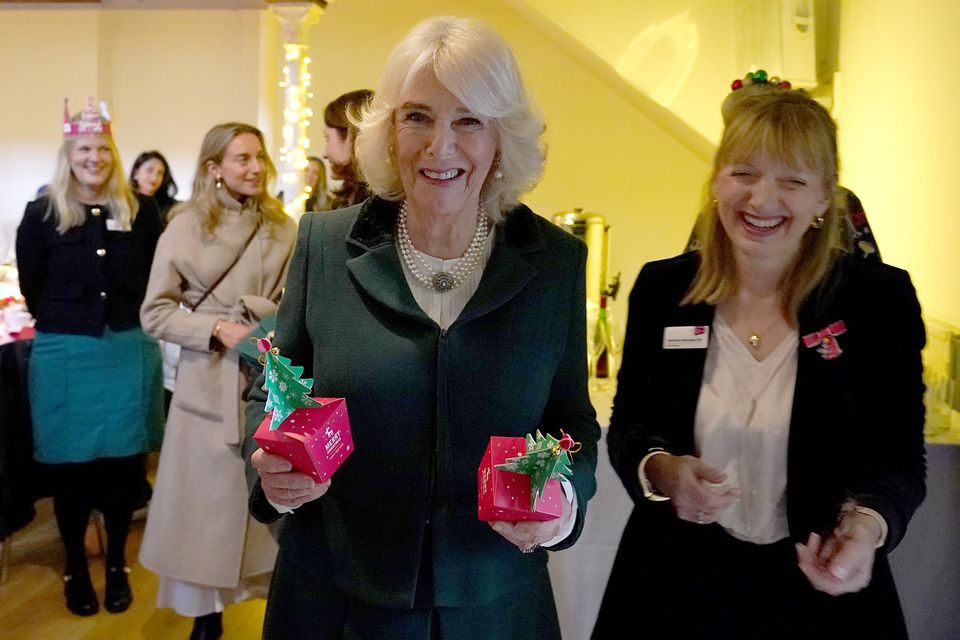 Camilla joined volunteers, staff and celebrity supporters for a ‘Festive Spread’ Christmas lunch (Alberto Pezzali/PA)