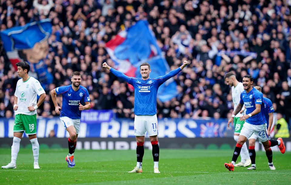 Lawrence, centre, has been in fine form for Rangers this season (Jane Barlow/PA)