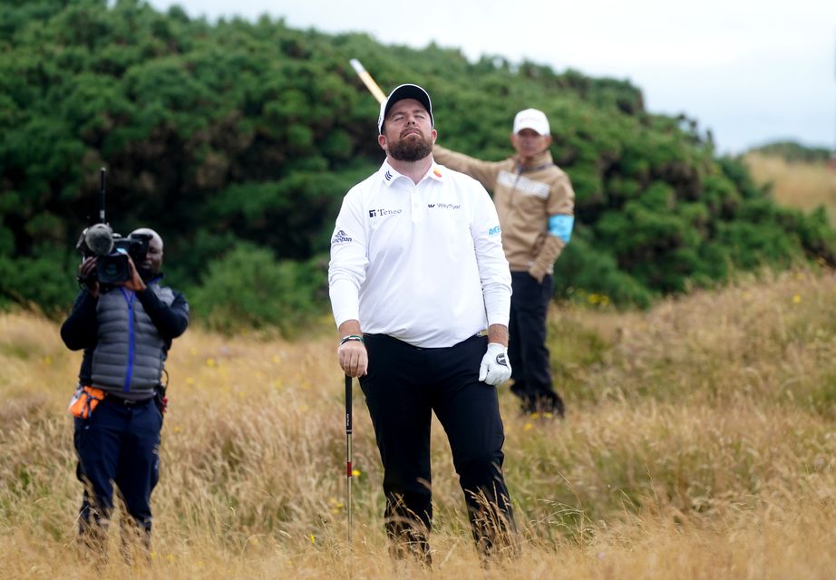 Shane Lowry reacts after he pulls his second shot on the 11th into the gorse at Royal Troon (Owen Humphreys/PA)