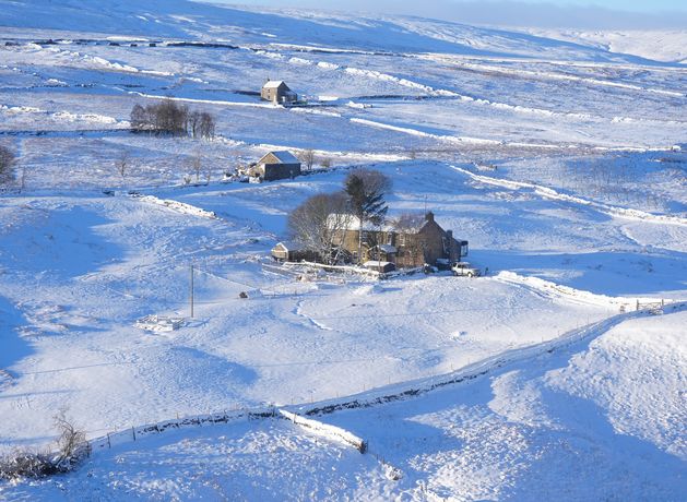 Snow and heavy winds bring travel disruption with airport runways shut