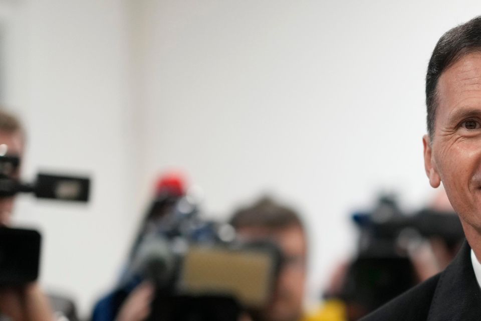 Dragan Primorac casts his ballot at a polling station in Zagreb (Darko Bandic/AP)