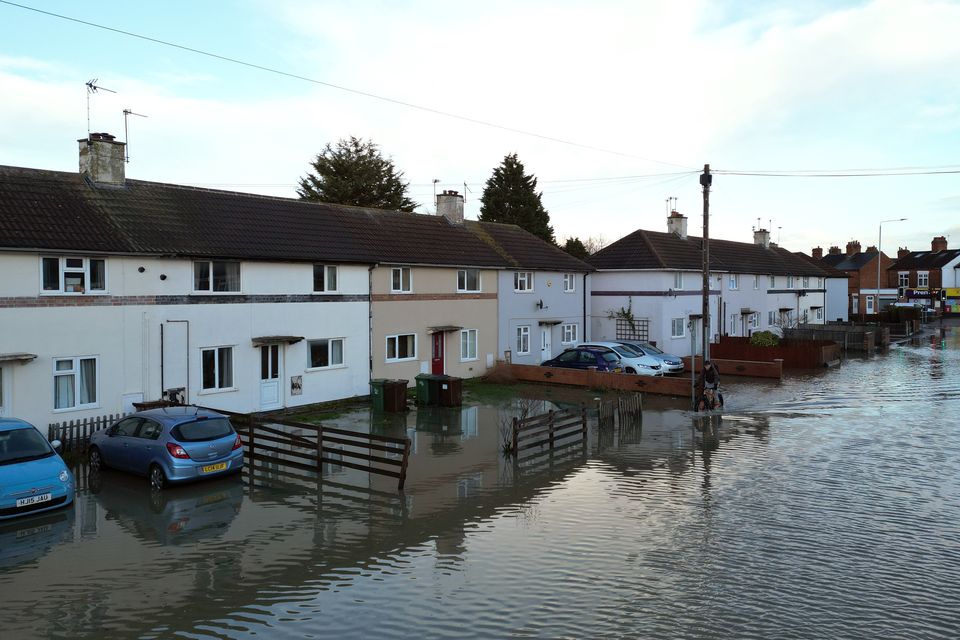 Flood water in Loughborough, Leicestershire as estimates show hundreds of properties have been flooded since New Year’s Eve (Joe Giddens/PA)