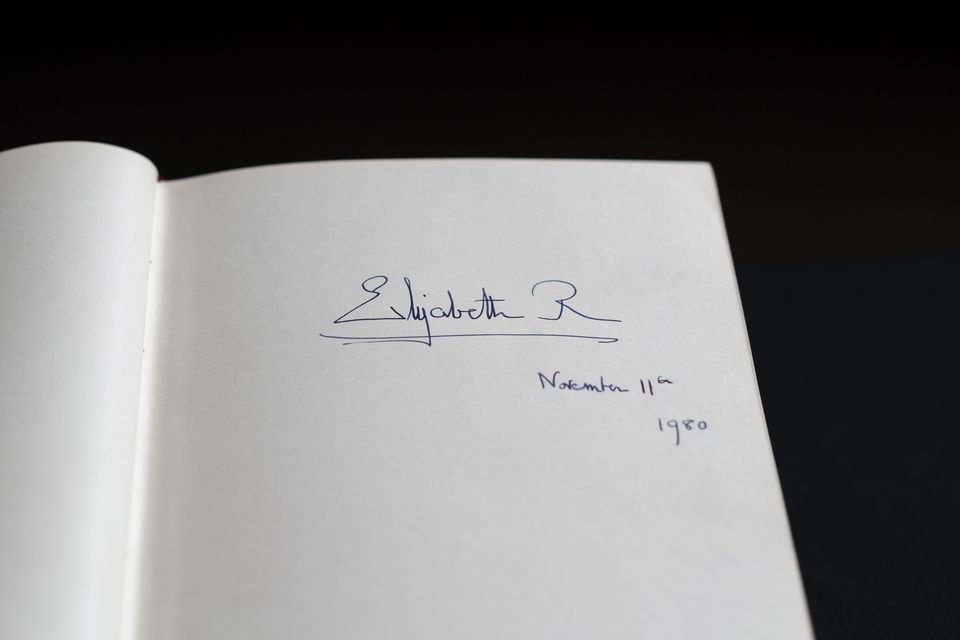 The signature of Queen Elizabeth II in one of the Downing Street Visitors Books (Ben Whitley/PA)