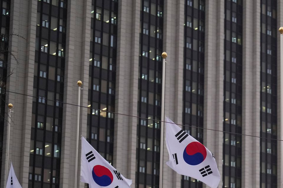 South Korean flags fly at half-mast in Seoul (Lee Jin-man/AP)