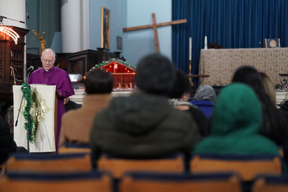 Bishop of Woolwich The Venerable Alastair Cutting speaking during a vigil at St Mary Magdalene church (Lucy North/PA)